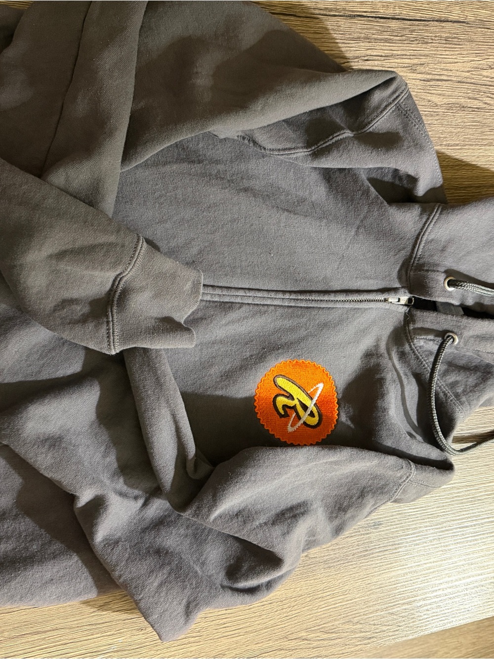 Gray Zip-Up Hoodie with Orange Patch
